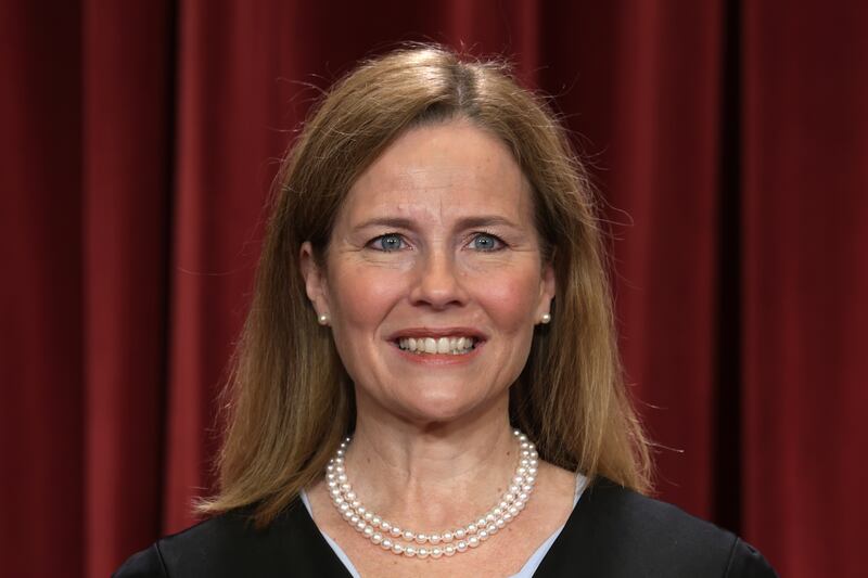 WASHINGTON, DC - OCTOBER 07: United States Supreme Court Associate Justice Amy Coney Barrett poses for an official portrait at the East Conference Room of the Supreme Court building on October 7, 2022 in Washington, DC. The Supreme Court has begun a new term after Associate Justice Ketanji Brown Jackson was officially added to the bench in September. (Photo by Alex Wong/Getty Images)