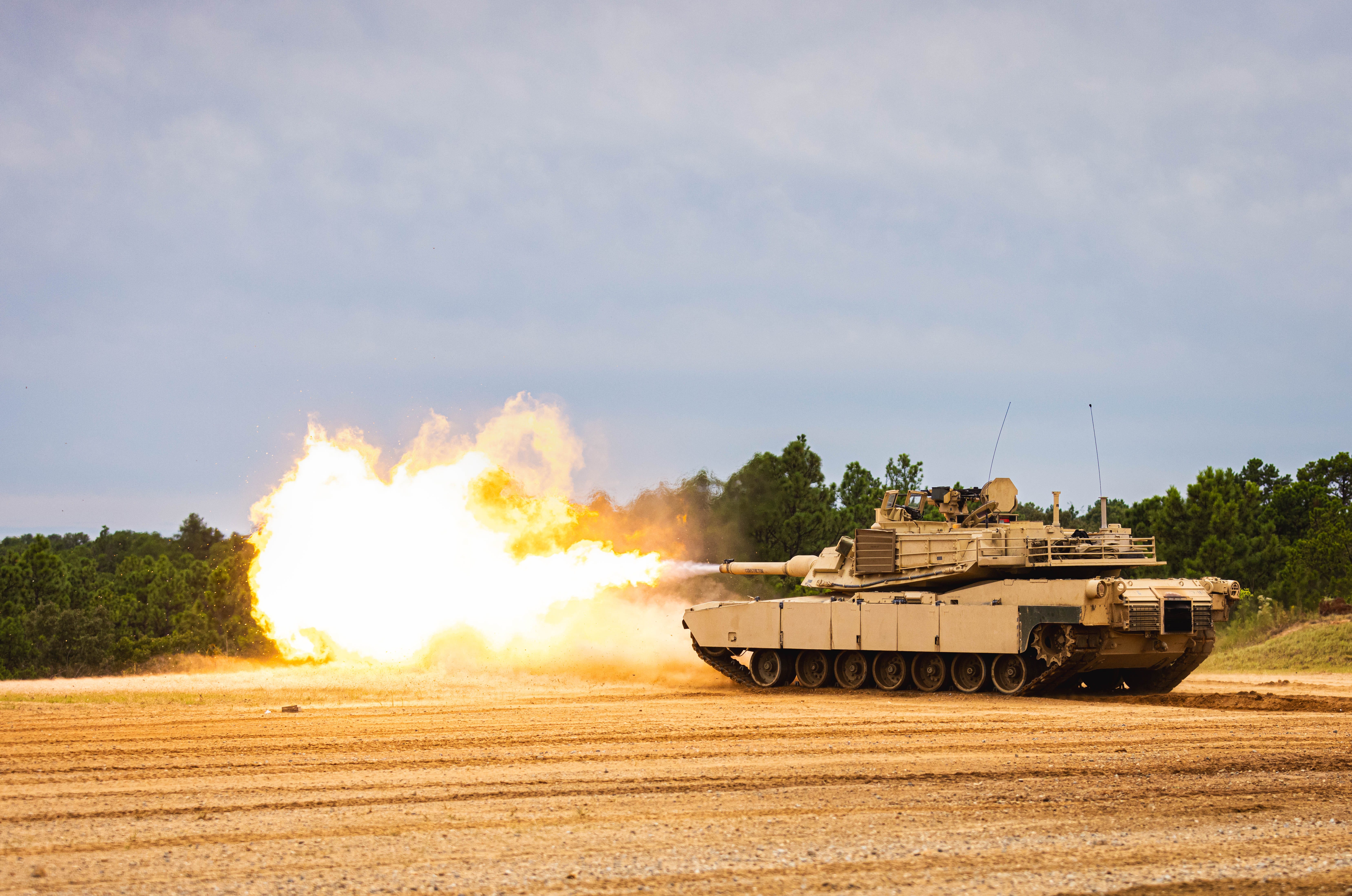 Soldiers from the Maneuver Center of Excellence conduct a live-fire demonstration featuring an M1 Abrams tank, Sept. 10, 2024 at Red Cloud Range on Fort Moore, Georgia, as part of the annual Maneuver Warfighter Conference.
