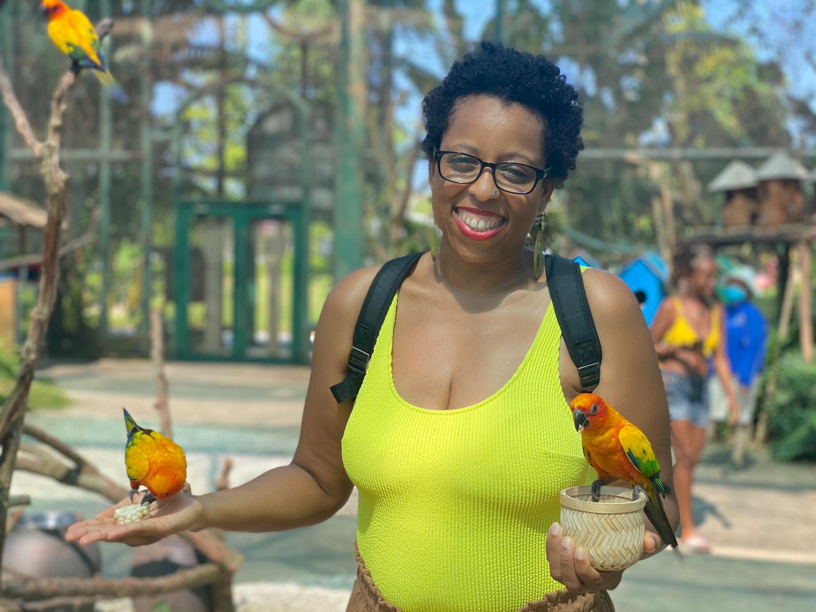Halona Black holding two birds