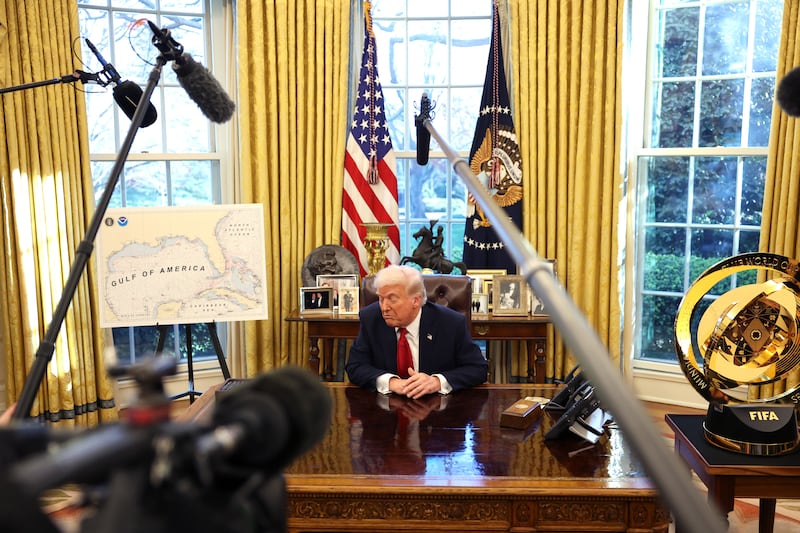 WASHINGTON, DC - MARCH 26: U.S. President Donald Trump speaks to the press next to a map of the "Gulf of America" after signing an executive order in the Oval Office of the White House on March 26, 2025 in Washington, DC. President Trump announced 25% tariffs on all foreign-made cars. (Photo by Win McNamee/Getty Images)