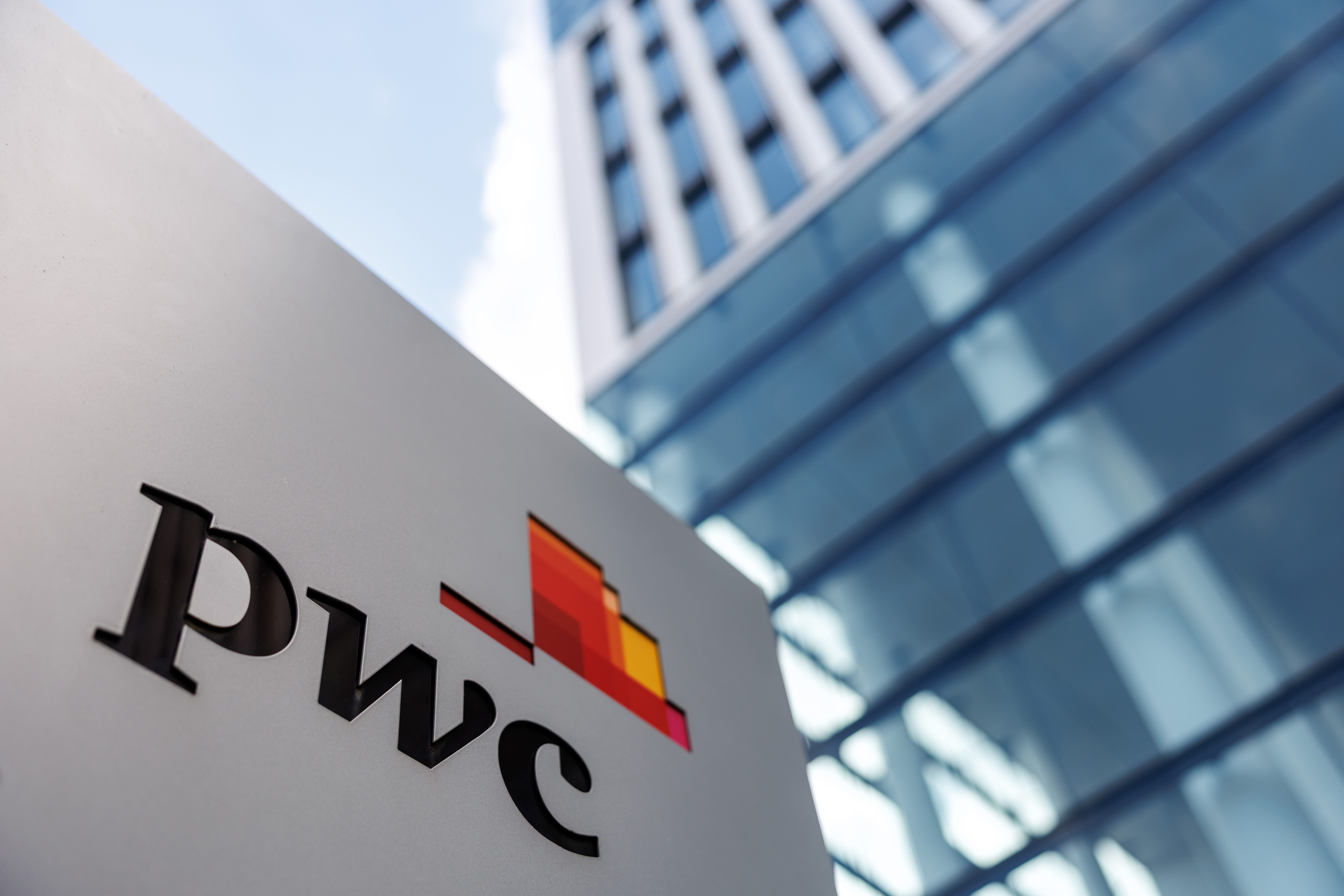 PwC logo outside a building