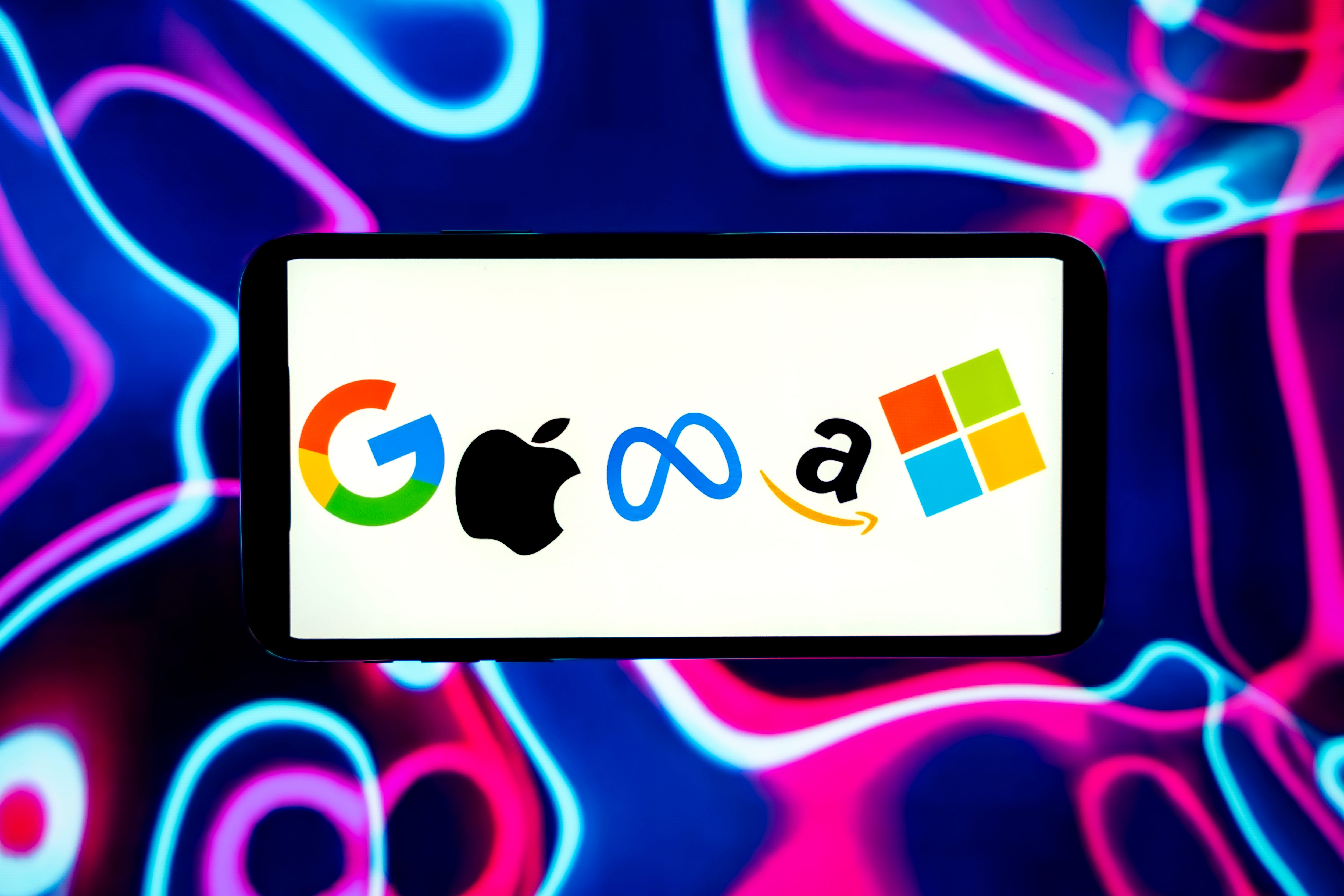 Logos of Google, Apple, Meta, Amazon, and Microsoft on screen