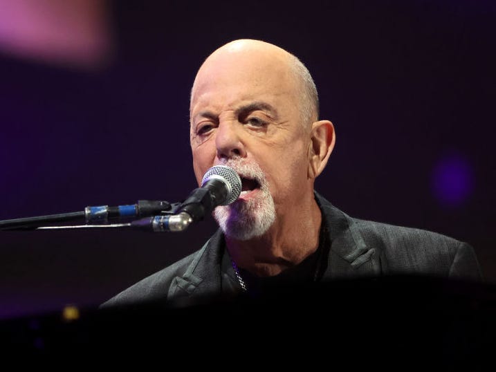 Billy Joel performing on stage