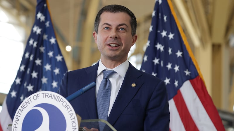 Pete Buttigieg speaks to questions during a news conference in Arlington, Virginia.