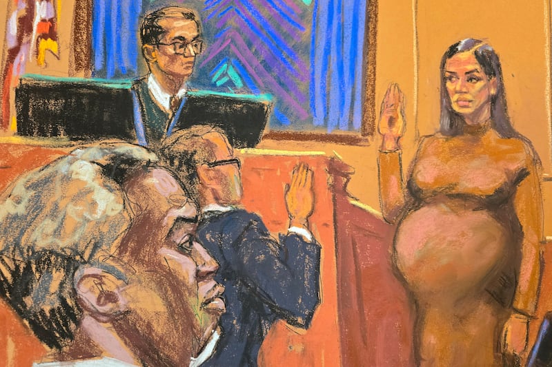 Sean “Diddy” Combs watches as his former girlfriend Cassie Ventura is sworn in as a prosecution witness.