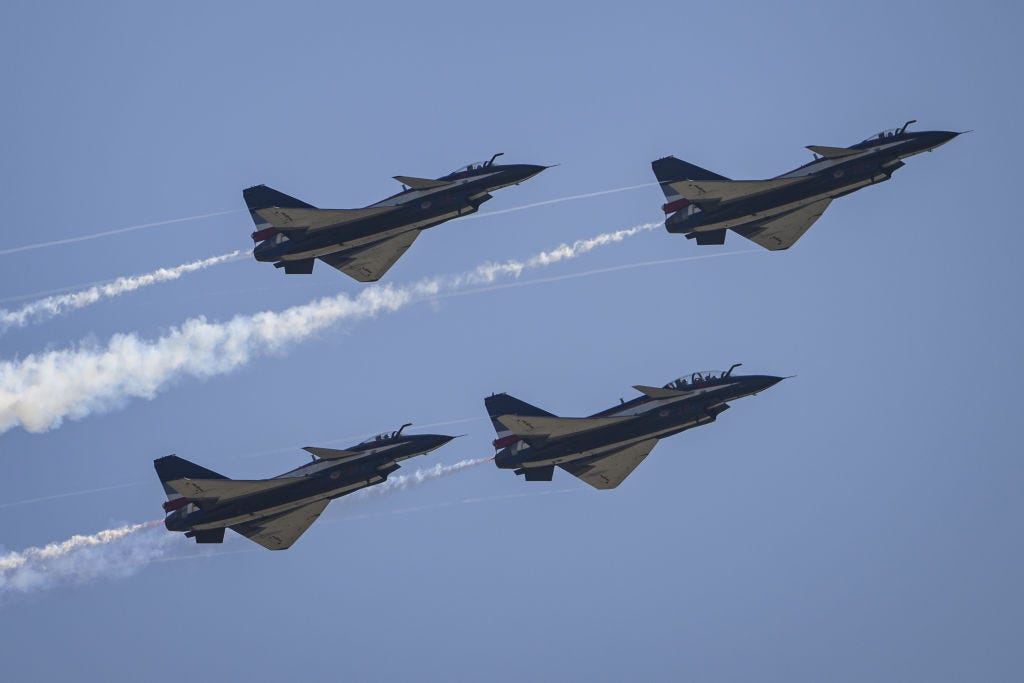 J-100