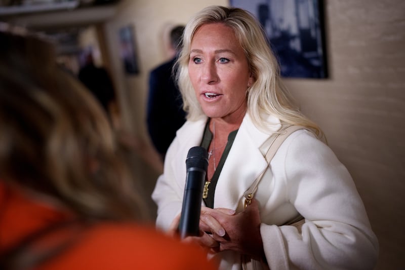 Rep. Marjorie Taylor Greene (R-GA) speaks to a reporter before a House Republican caucus meeting at the U.S. Capitol on February 25, 2025 in Washington, DC.
