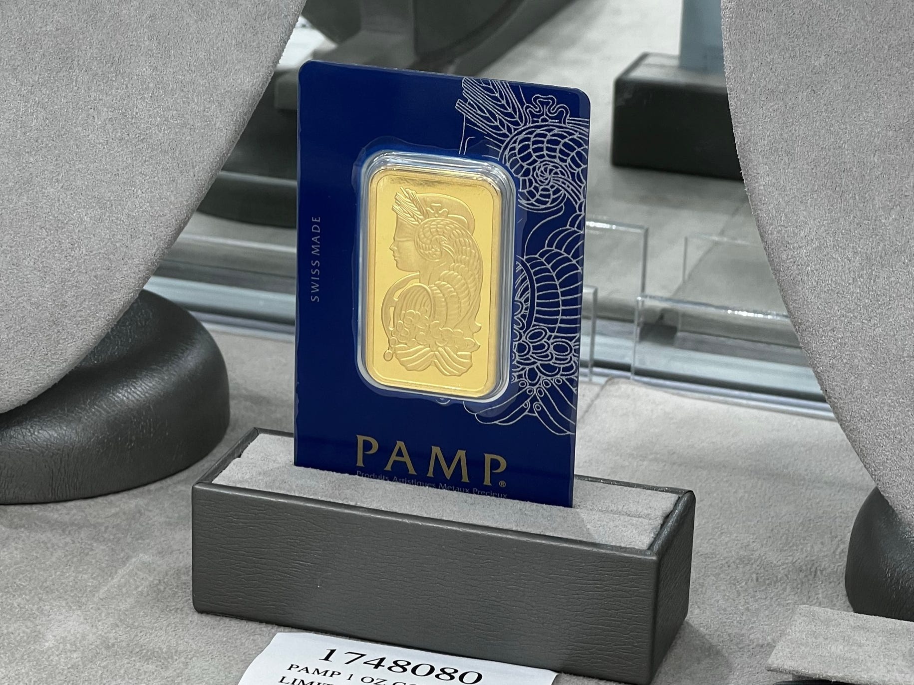 A one-ounce PAMP gold bar on display at a Costco warehouse