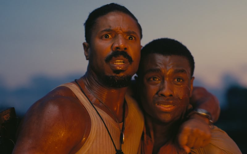 Michael B. Jordan as Stack and Miles Caton as Sammie Moore