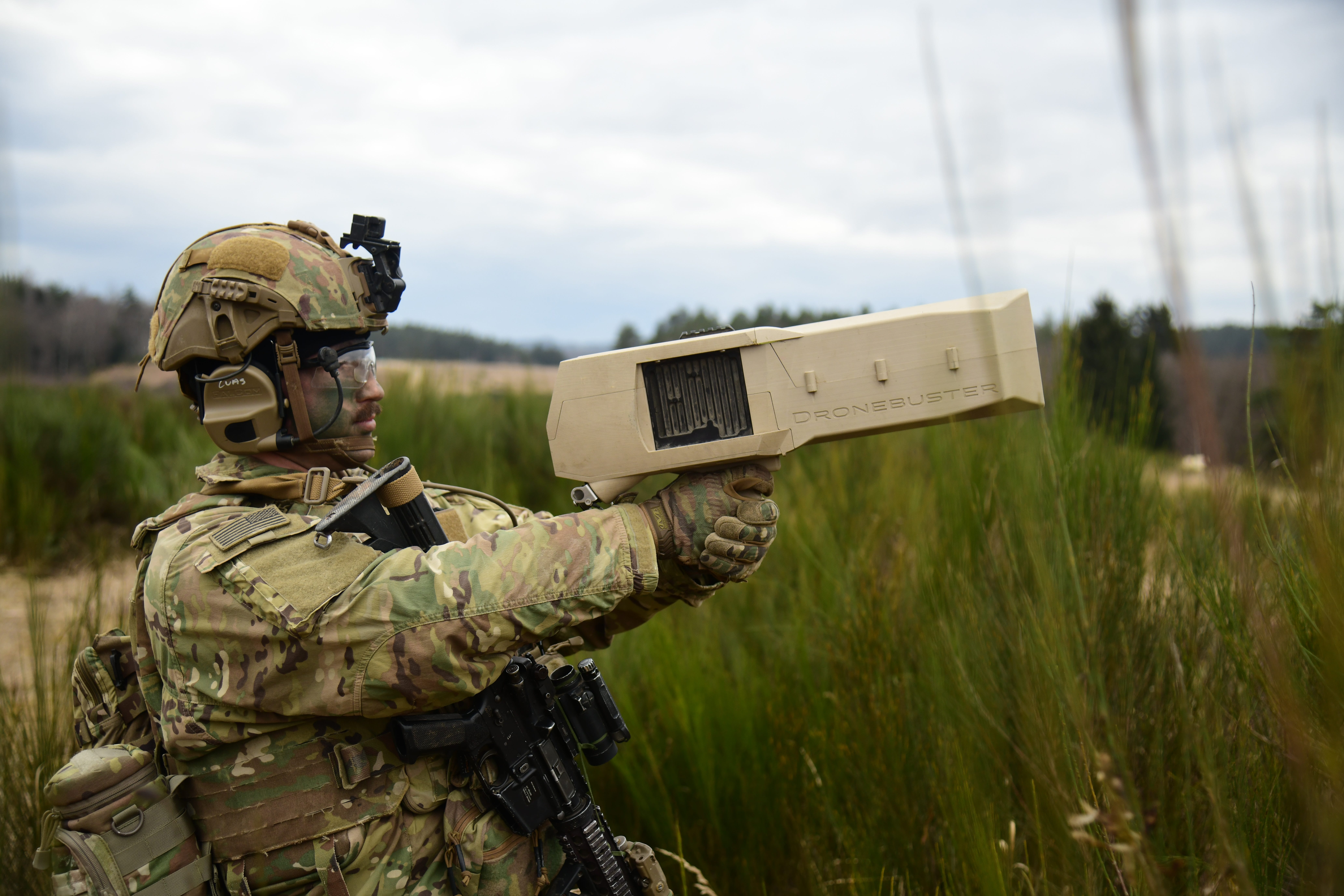 A U.S. Soldier assigned to 3rd Brigade, 10th Mountain Division uses a Dronebuster 3B to disrupt an oncoming drone during a live fire exercise at the 7th Army Training Command's Grafenwoehr Training Area, Germany, Feb. 25, 2025.