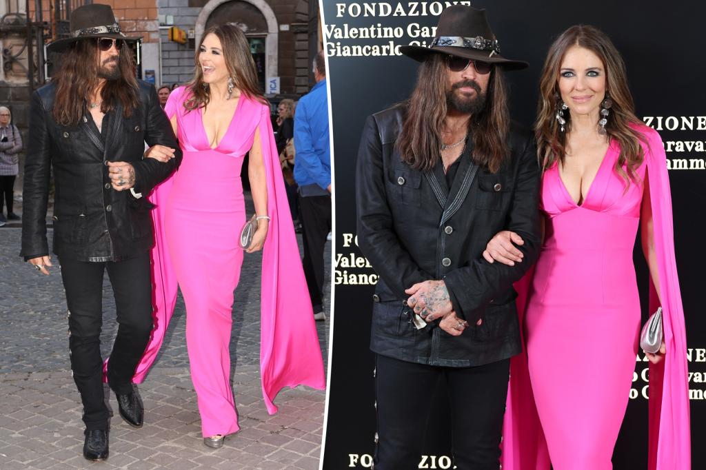 Elizabeth Hurley makes red carpet debut with boyfriend Billy Ray Cyrus in vibrant Barbie-pink gown
