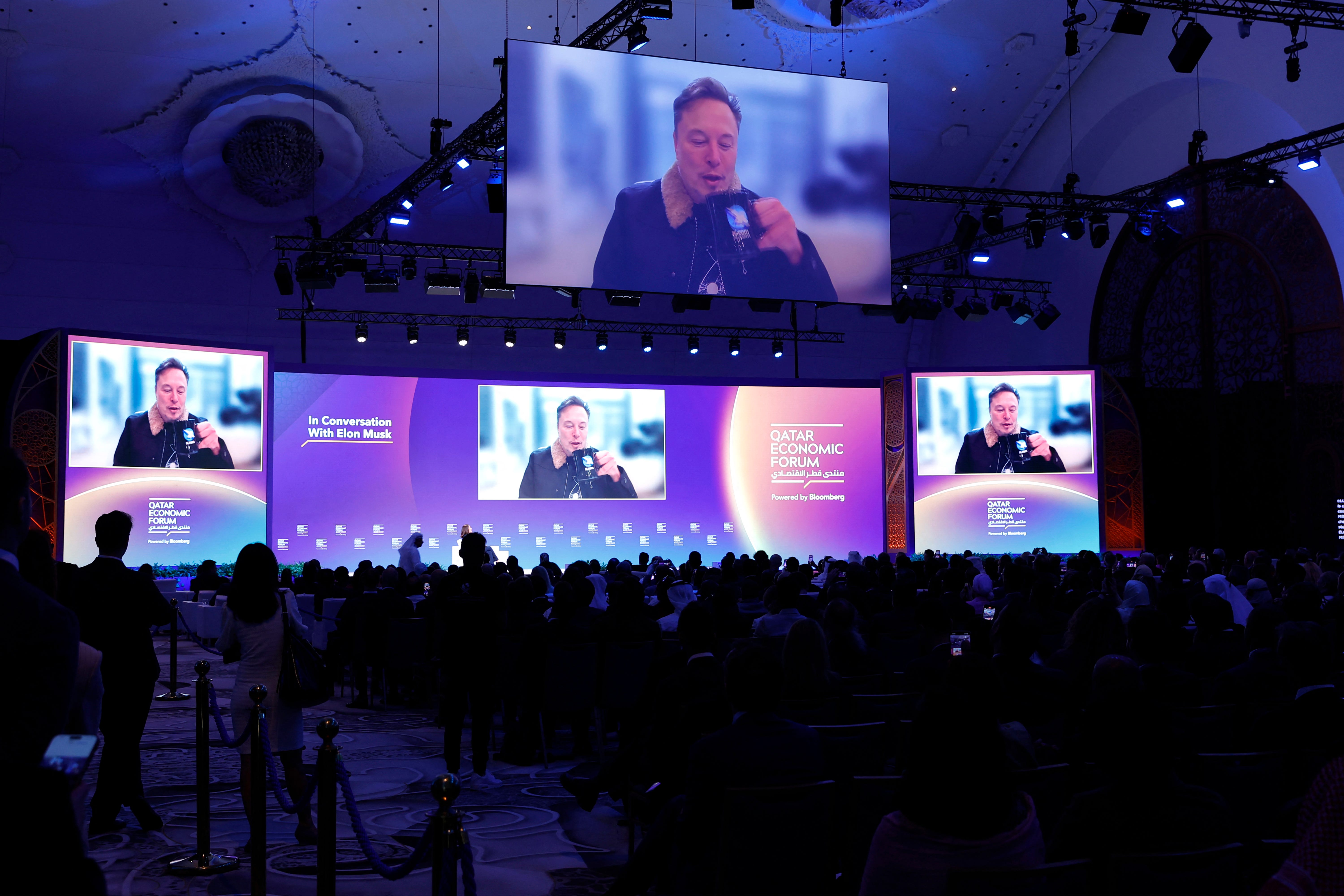 Elon Musk on a screen