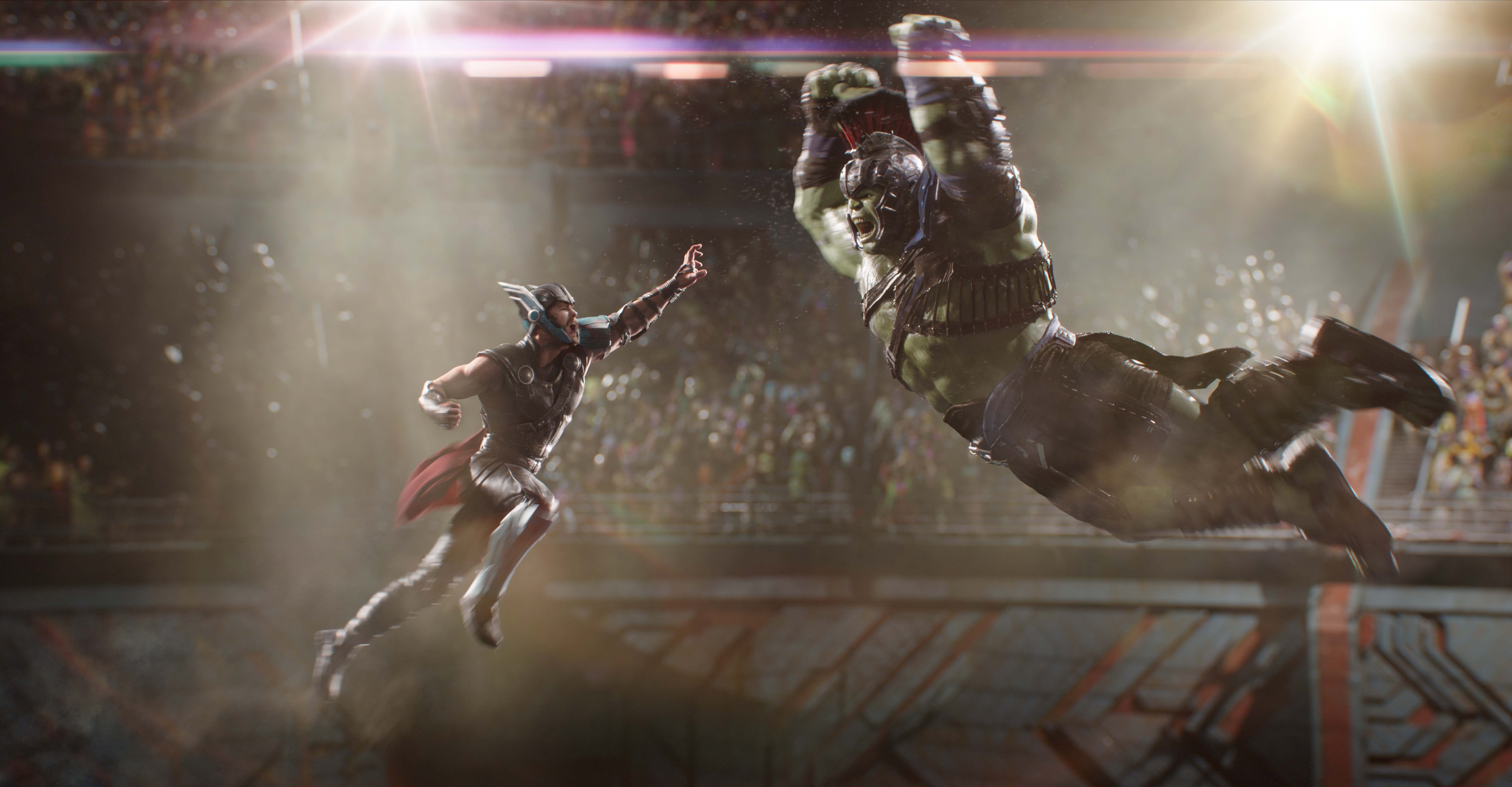 Thor and Hulk jump into the air to smash each other in Thor: Ragnarok