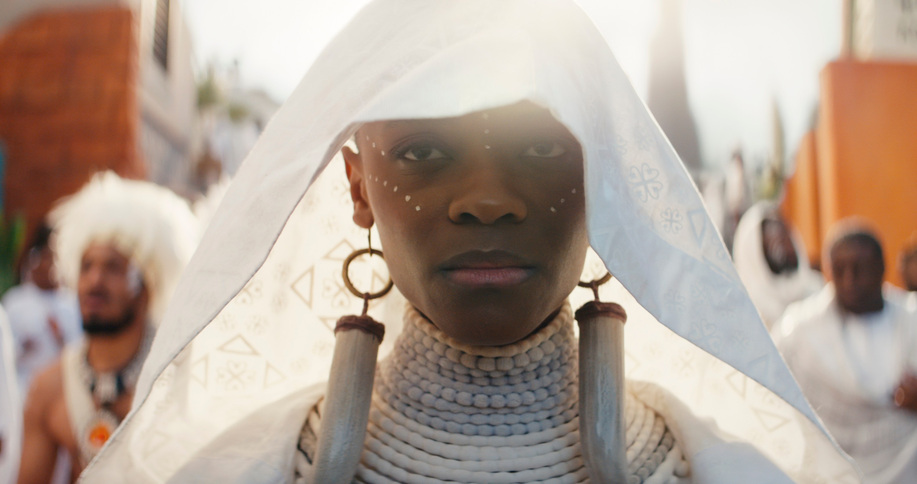 Letitia Wright as Shuri, in mourning clothes in Black Panther: Wakanda Forever.