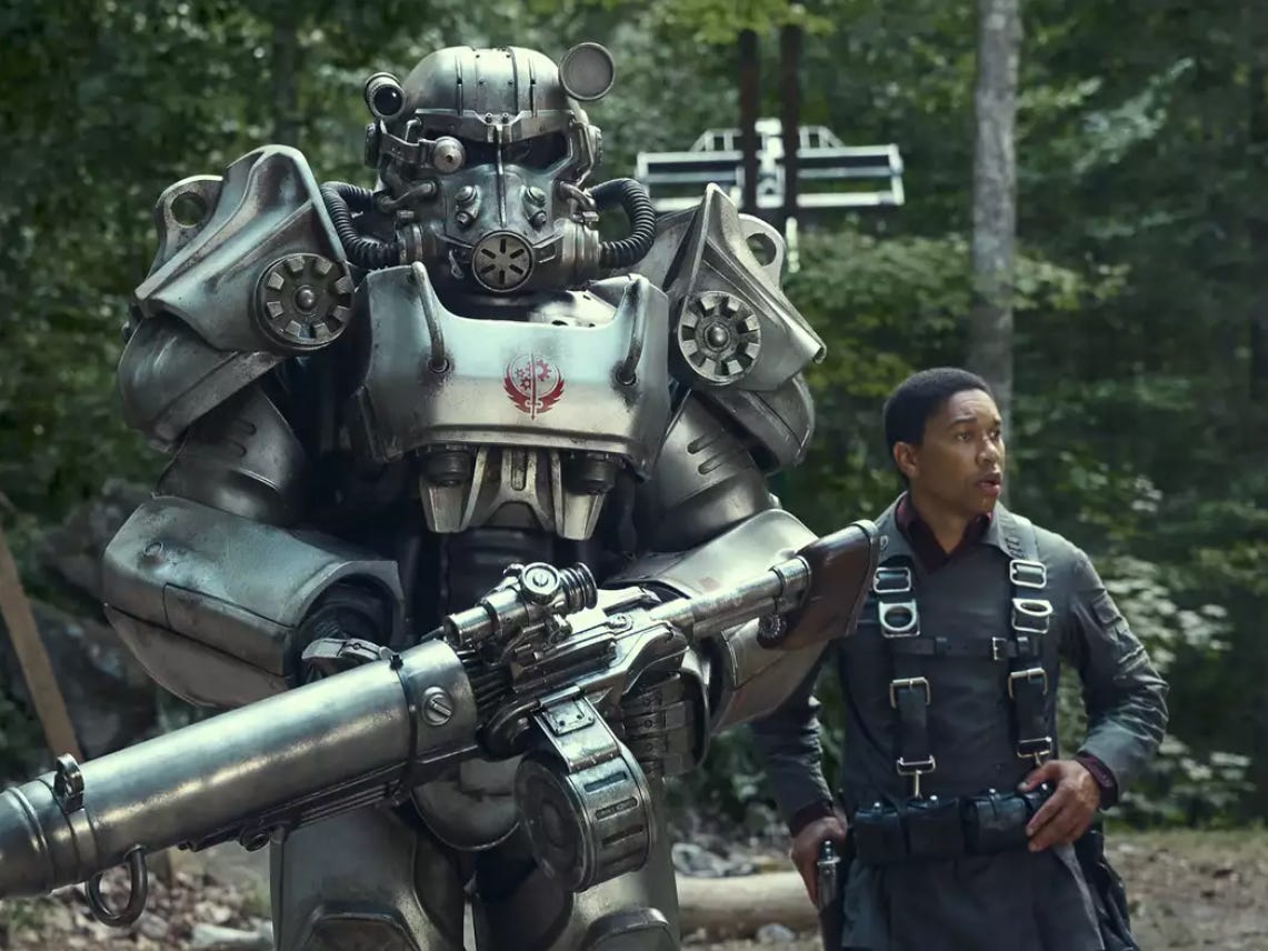 A Brotherhood of Steel knight and his squire, Maximus (Aaron Moten).