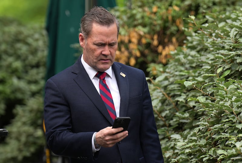 Former National Security Advisor Michael Waltz looks at his phone as he prepares for a TV interview at the White House on May 01, 2025 in Washington, DC. Donald Trump has named him as the next U.S. Ambassador to the United Nations.