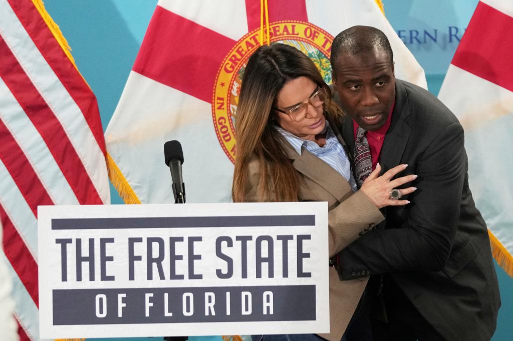 Florida surgeon general leaps onto stage and saves the day as state senator faints at presser in scary scene: video