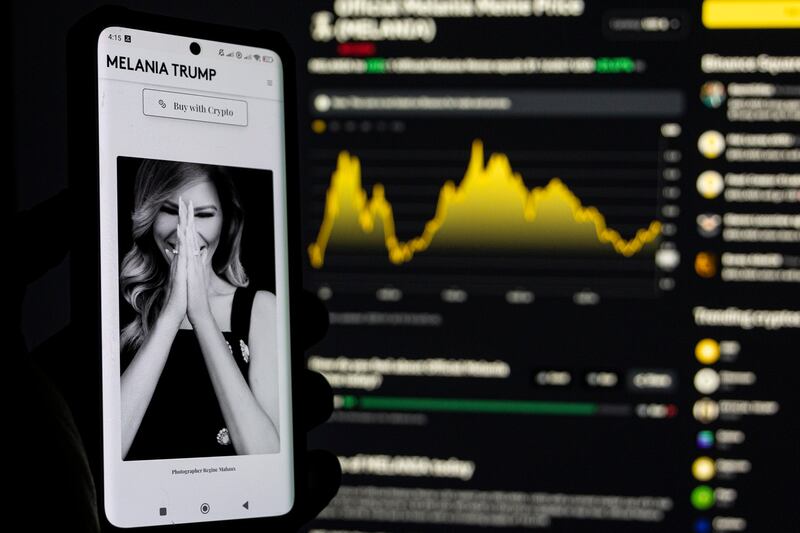 Photo illustration of Melania Meme, a memecoin launched by Melania Trump displayed on a smartphone and a computer screen with the current price charts showed from Binance cryptocurrency exchange page. January 20, 2024 in Amsterdam, the Netherlands (Photo by Nicolas Economou/NurPhoto via Getty Images)