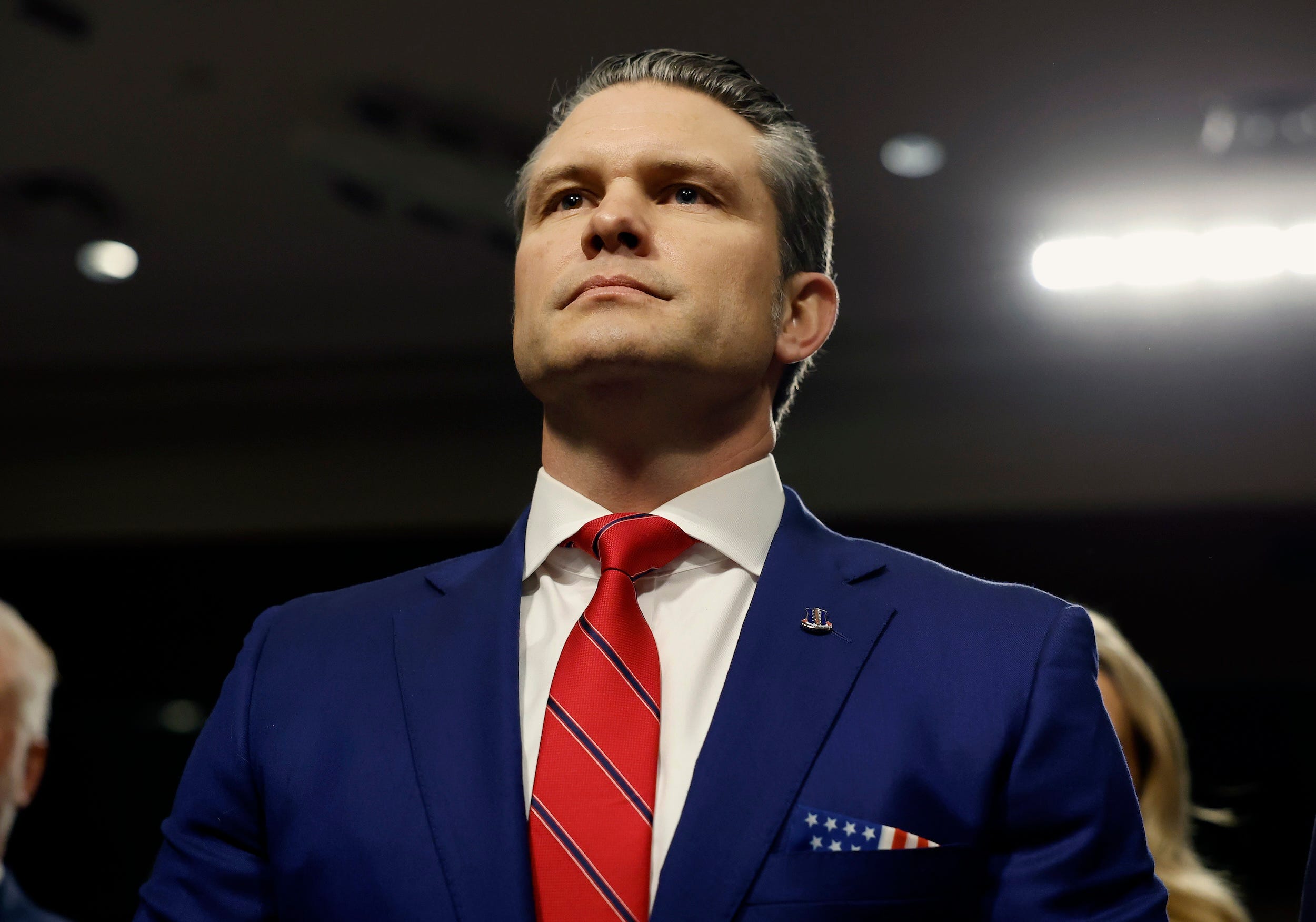 Pete Hegseth stands before his Senate confirmation hearing