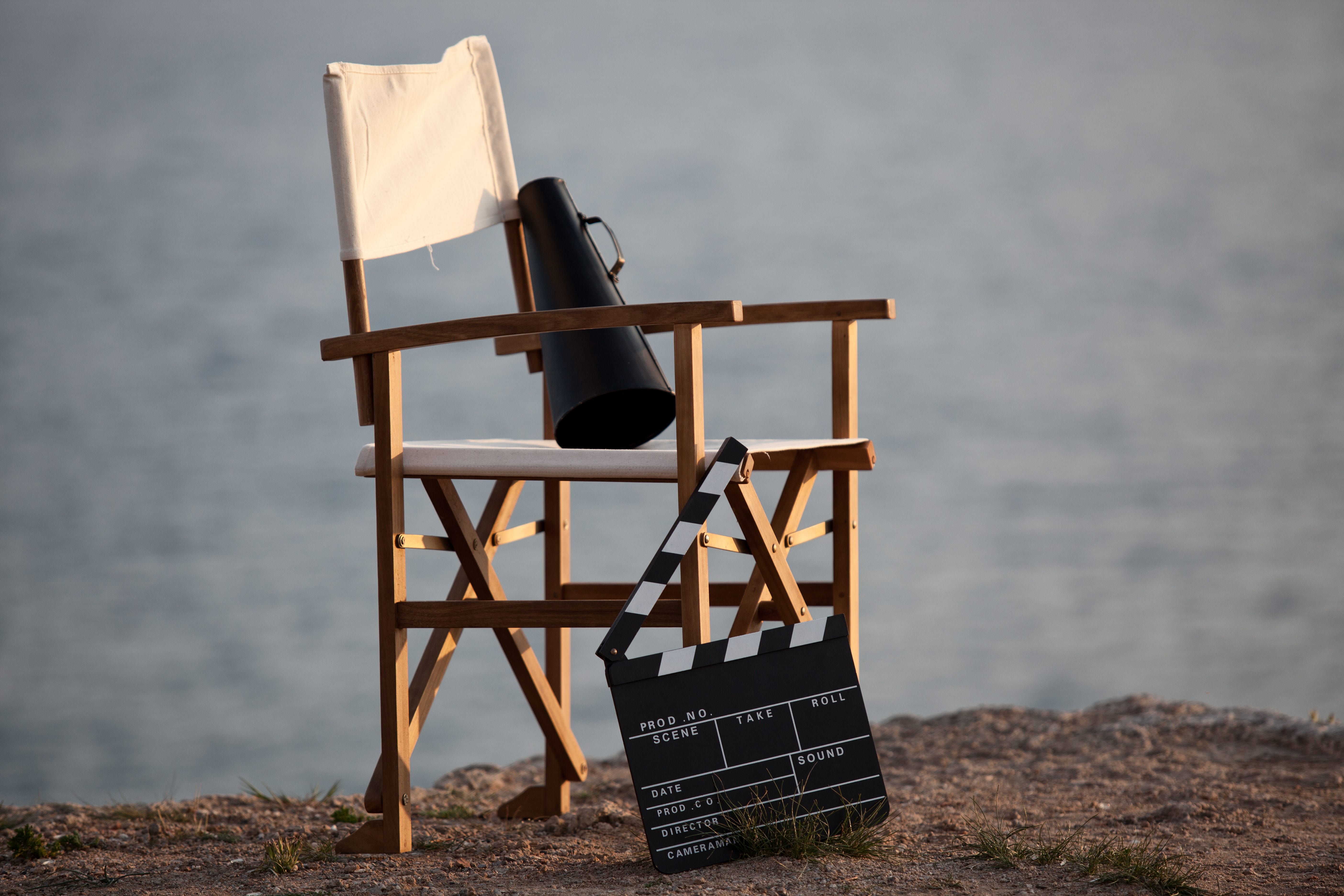 A director's chair with a clapperboard.