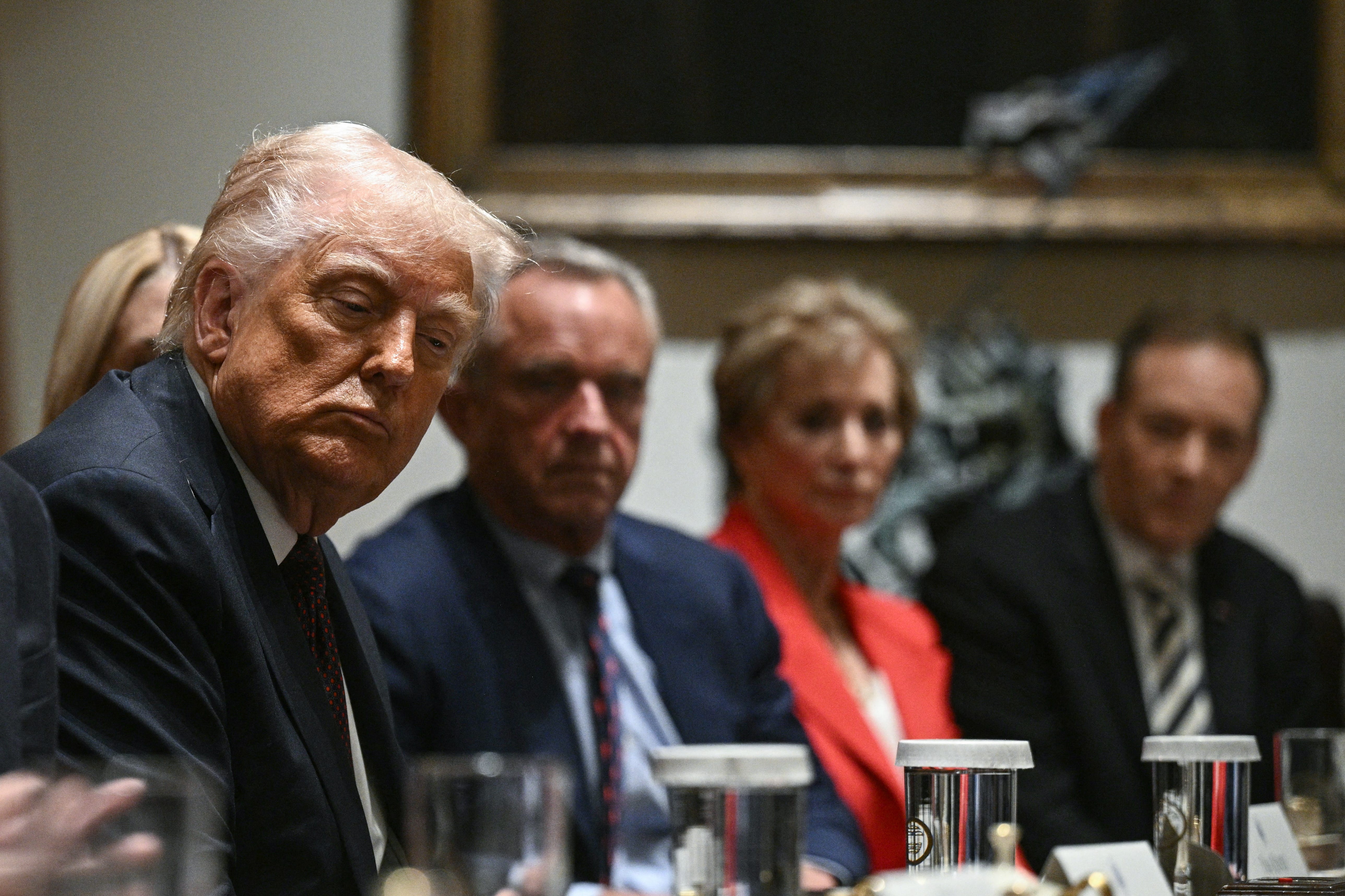 President Donald Trump sitting at a Cabinet meeting.