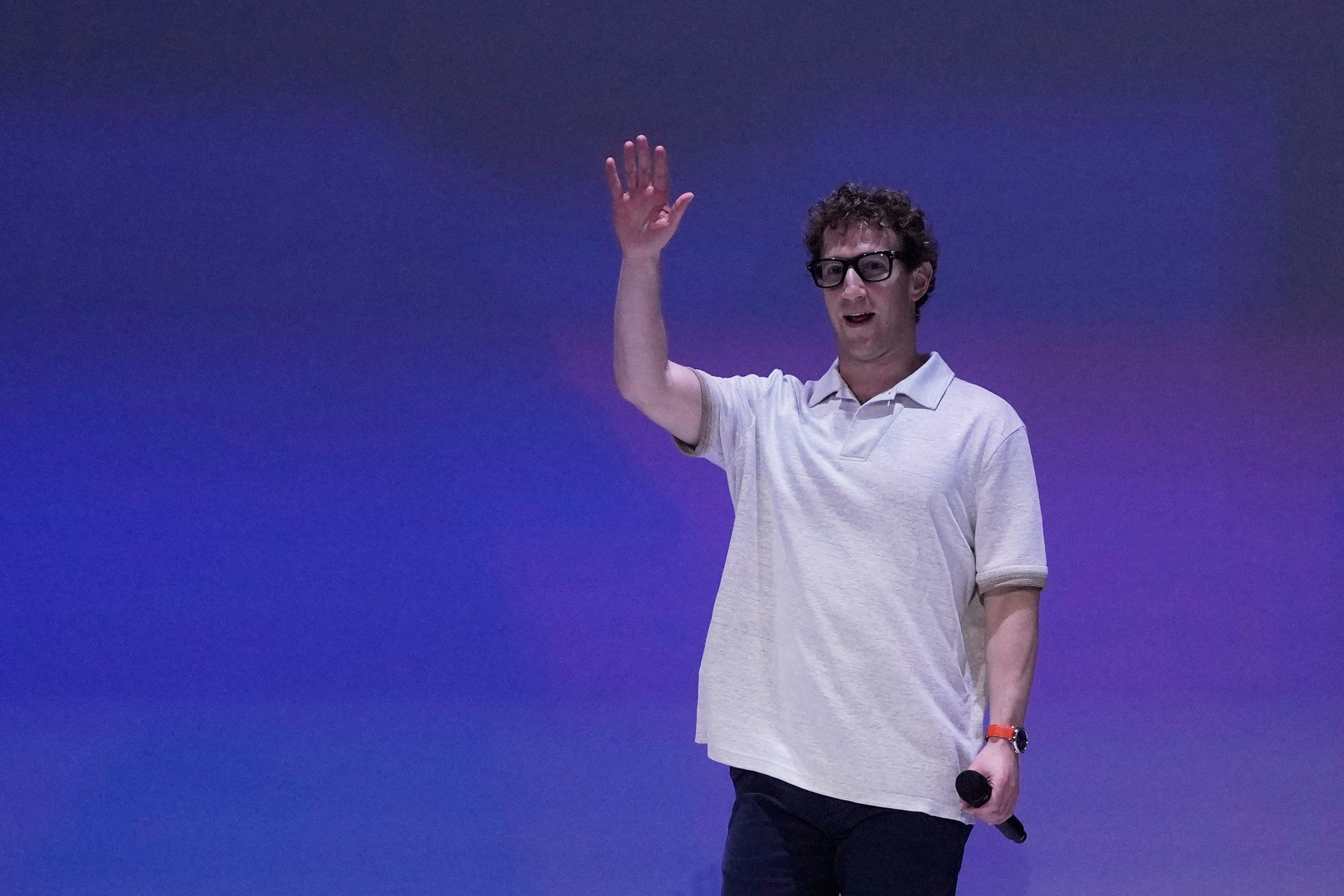 Meta Founder and CEO Mark Zuckerberg waves before speaking at LlamaCon 2025