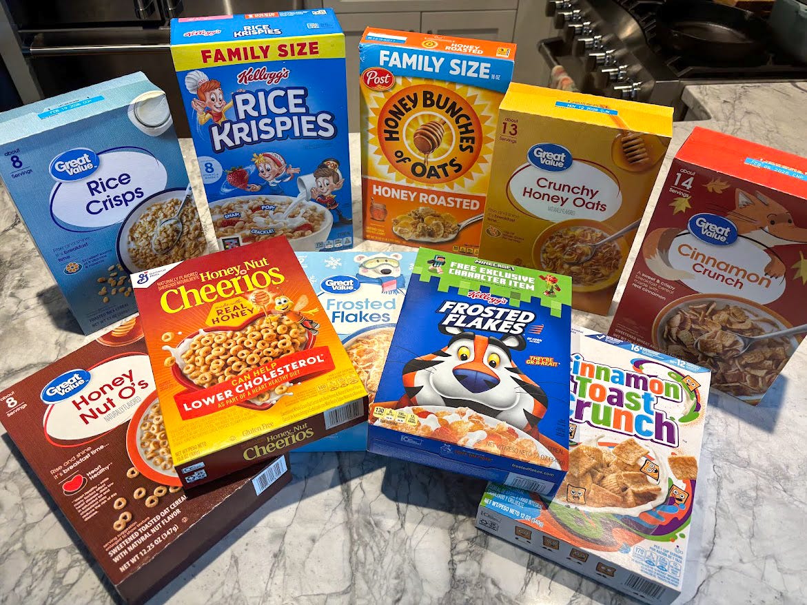 Ten boxes of brand-name and generic cereals on a kitchen counter.