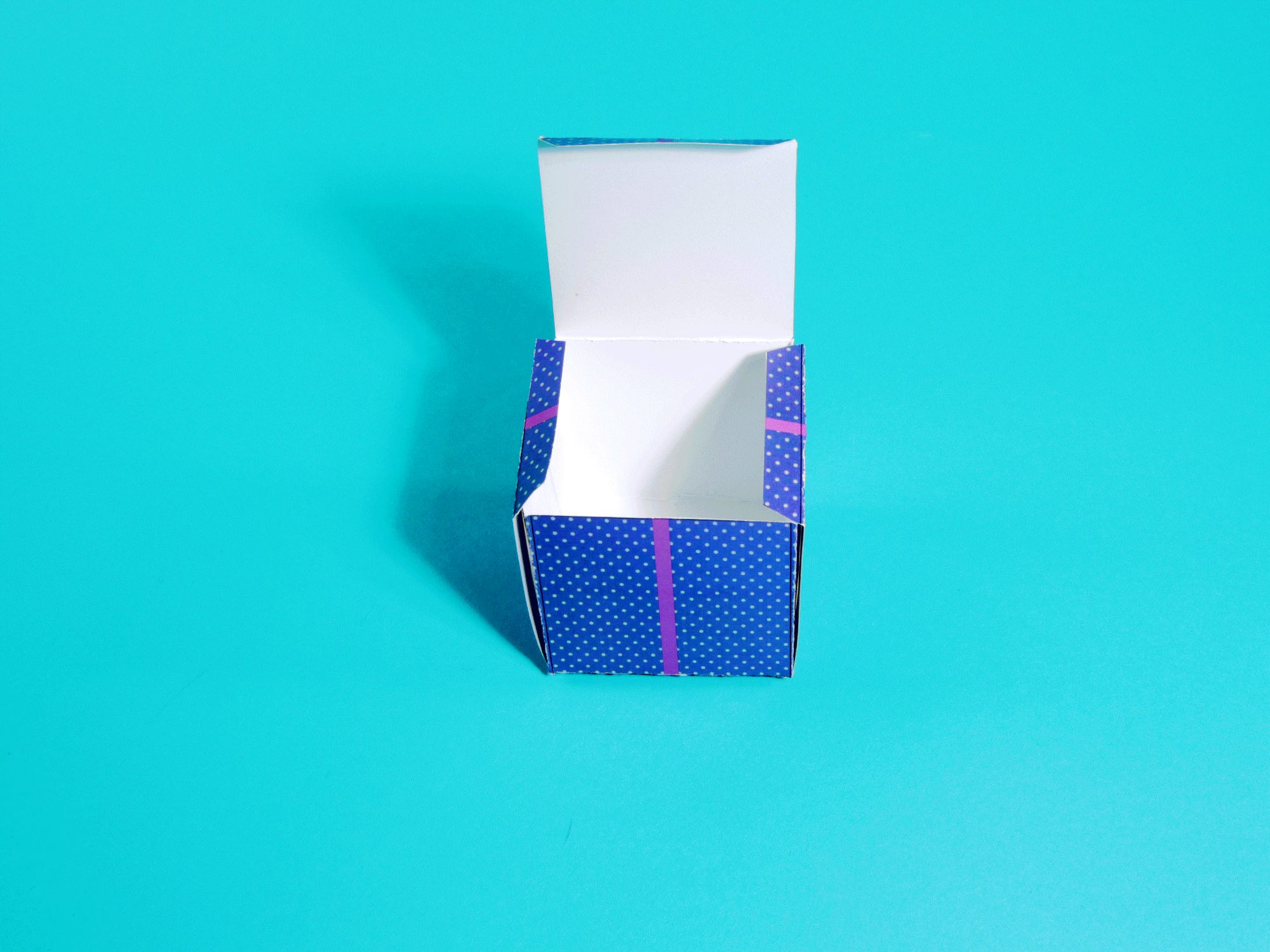 A paper present box opening side by side