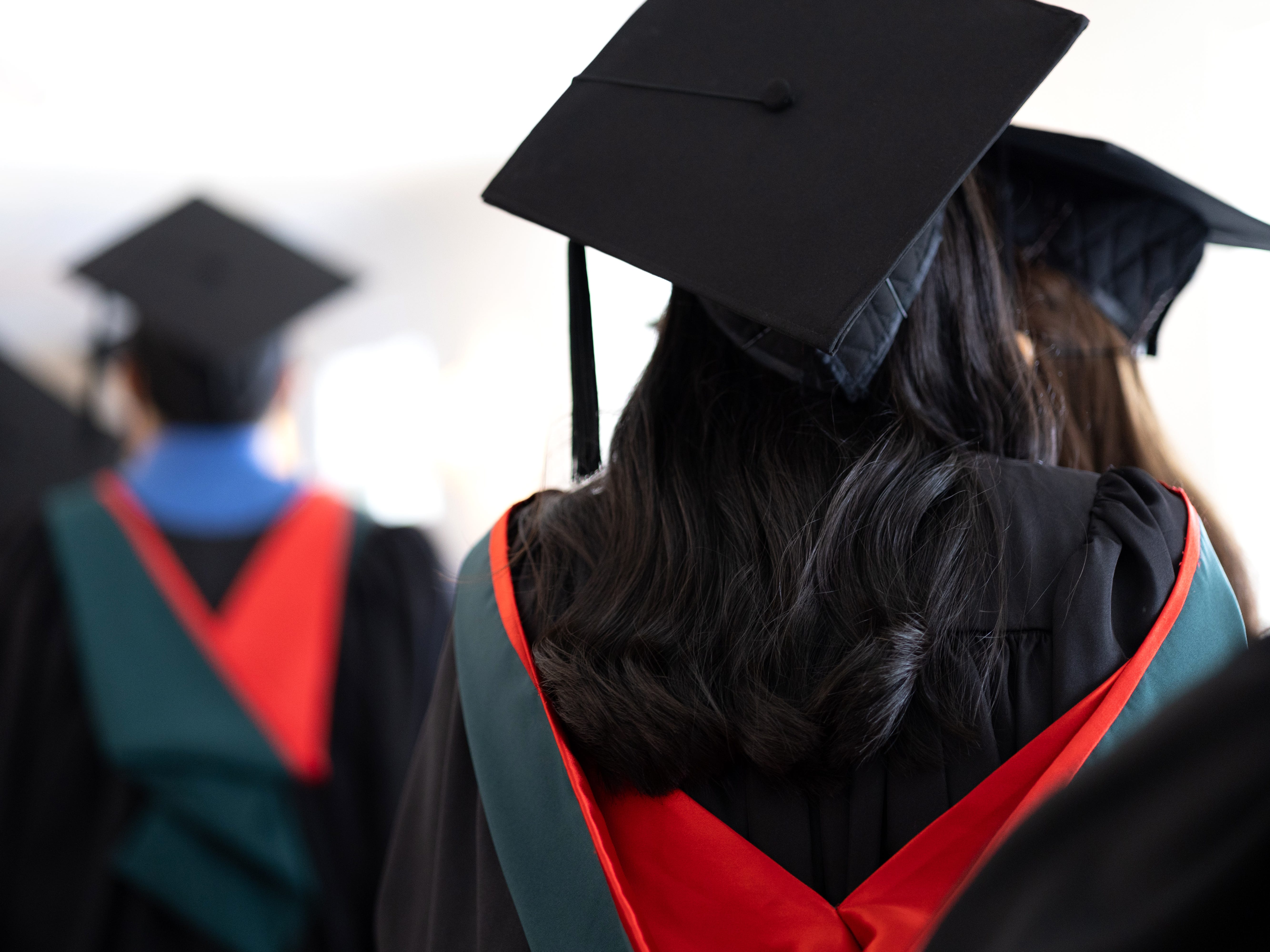 the back of a colelge graduates head