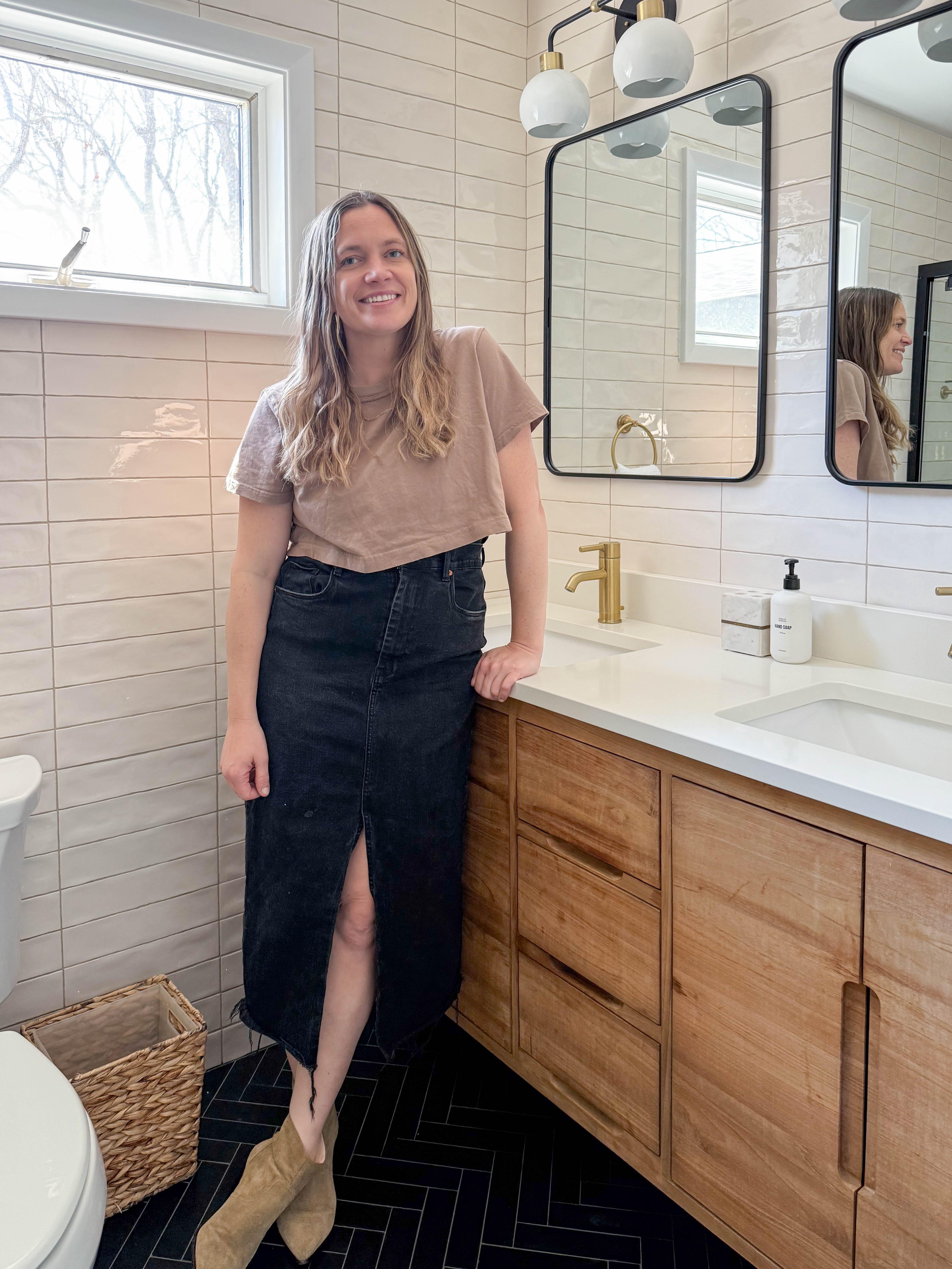 Blythe Graham-Jones stands in front of ktichen sink