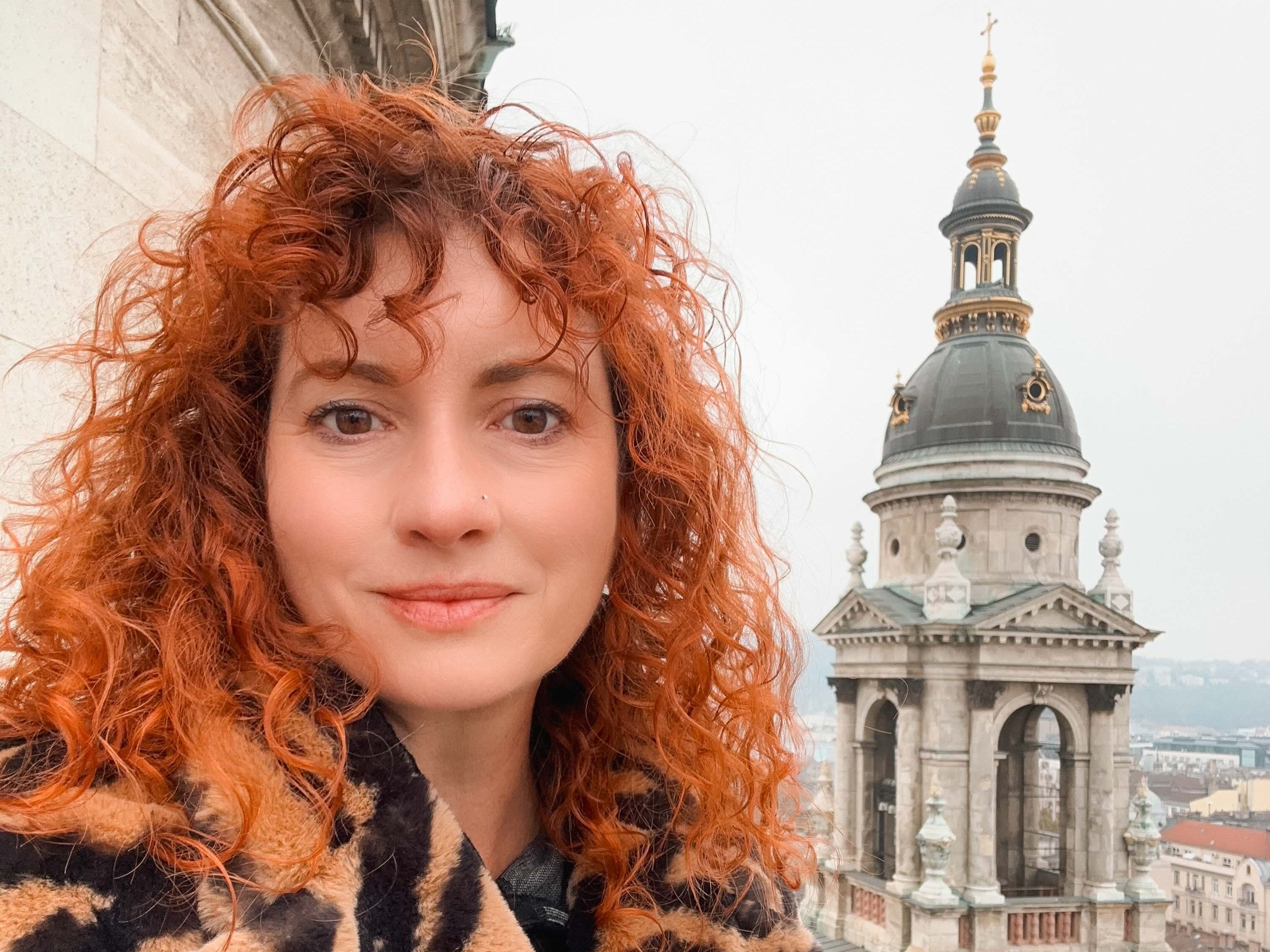 Woman posting in Budapest, Hungary.