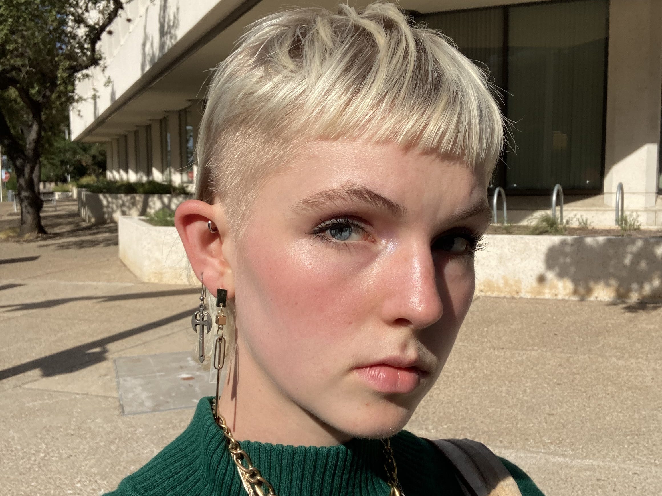 Selfie of Elizabeth Winkler in green sweater