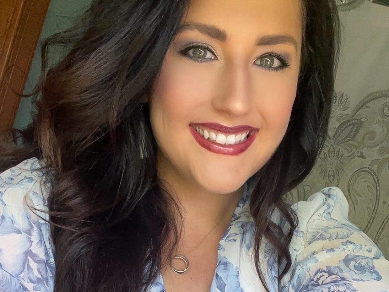 Kristina McDonald wearing a floral outfit
