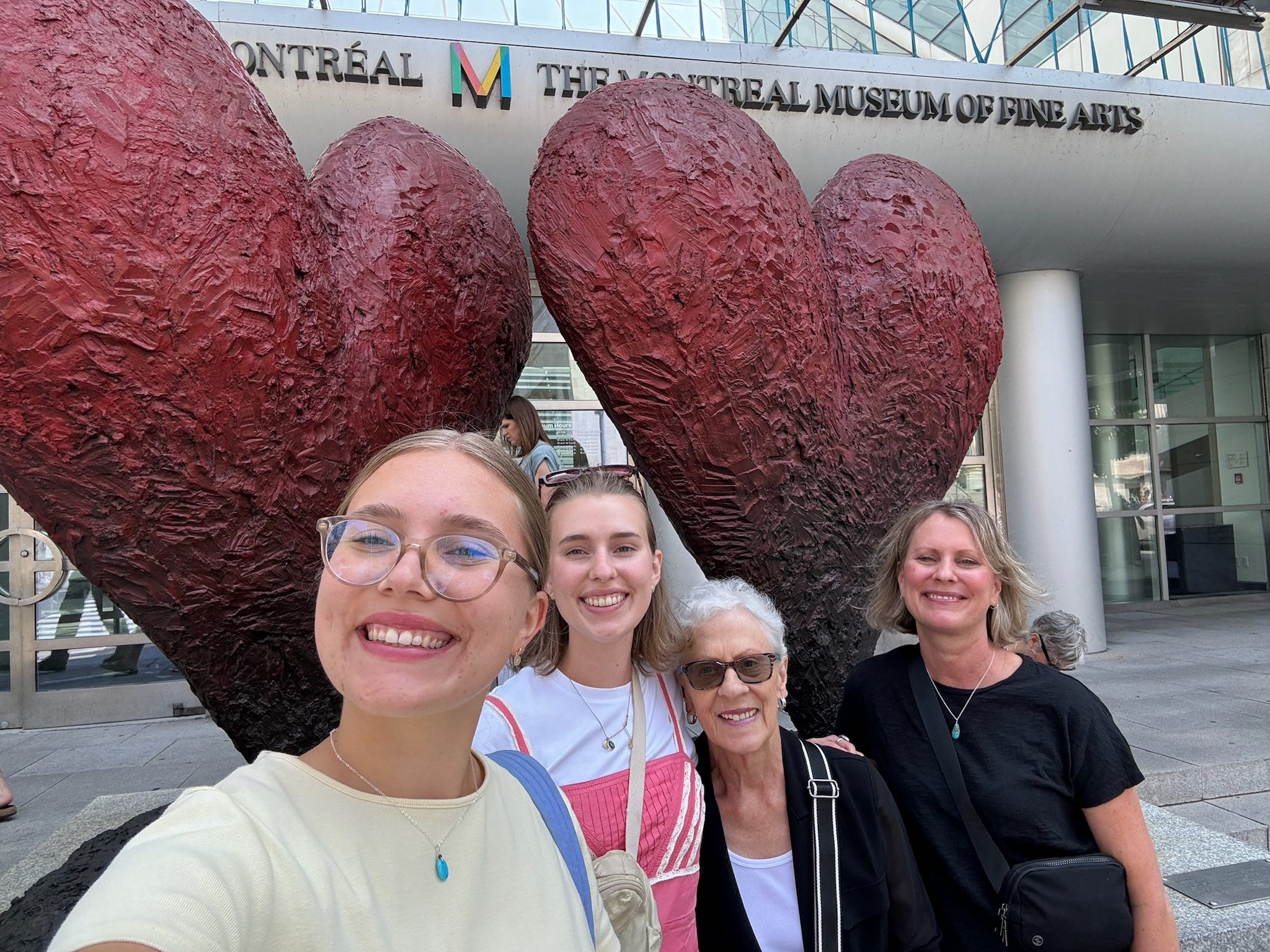 The author and her family posing outside the Montreal Museum of Fine Arts.