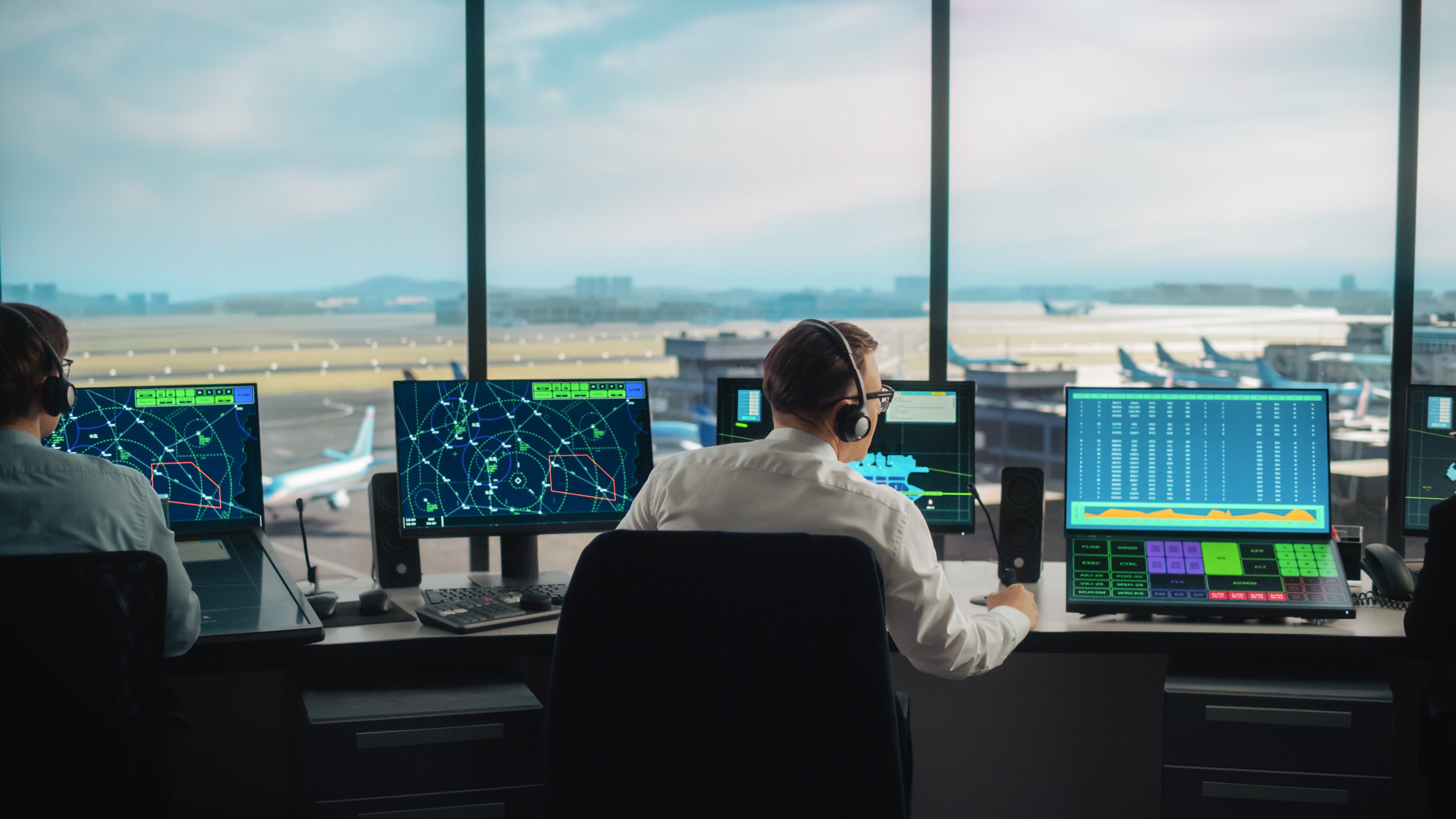 Air Traffic Control Team Working in a Modern Airport Tower