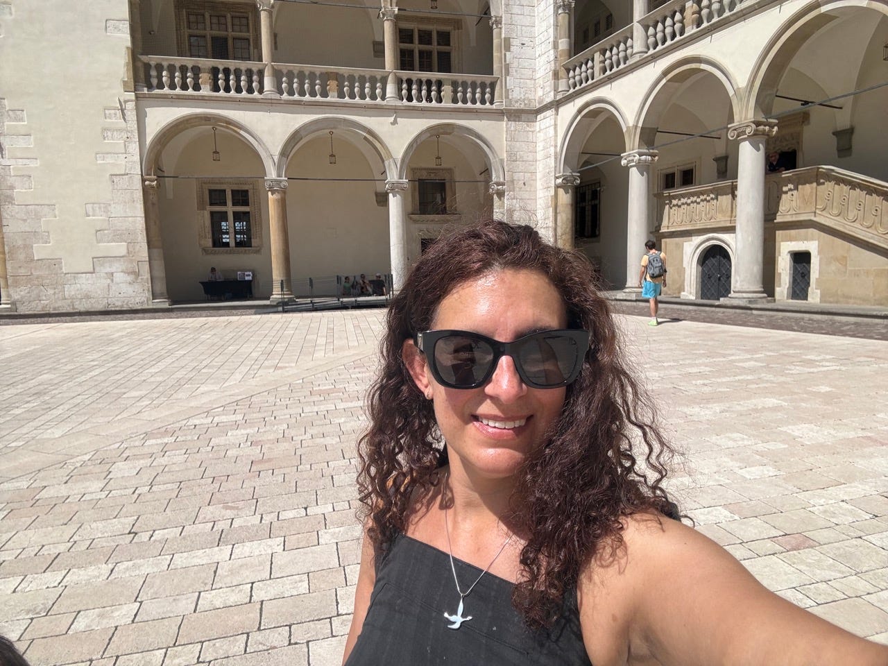 Author Jamie Davis Smith smiling in Poland