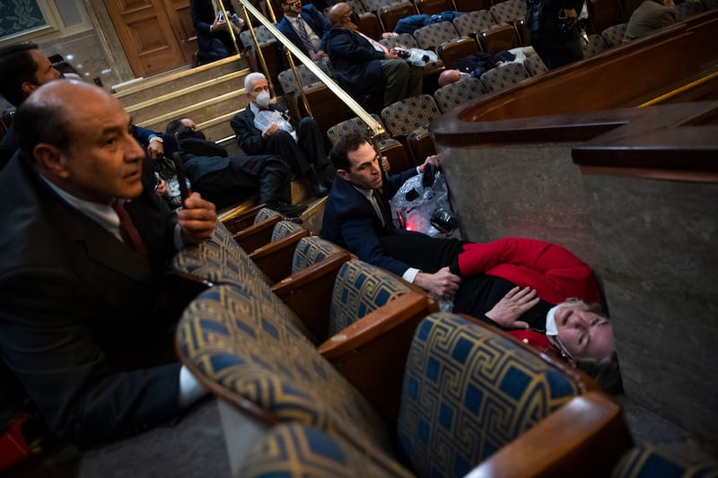 Crow and Wild take cover as protesters disrupt the joint session of Congress