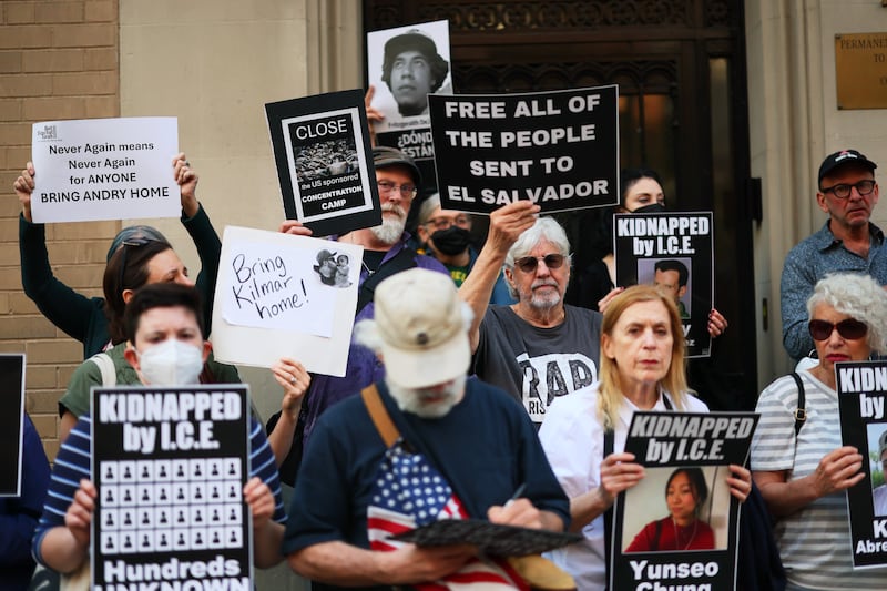 Demonstrators gather to protest against the deportation of immigrants to El Salvador
