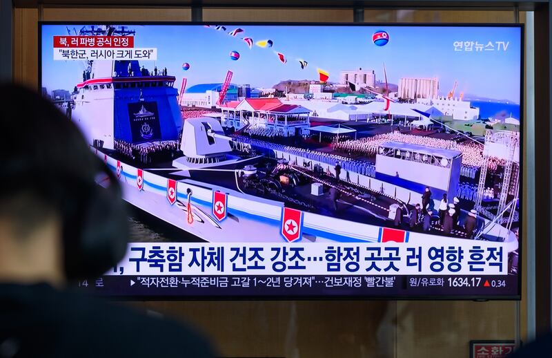 A news broadcast with North Korea's new destroyer Choi Hyun at a launching ceremony at a shipyard in the North Korea's western port city of Nampo.