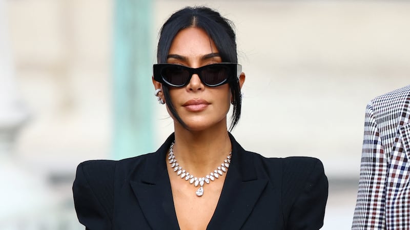 Kim Kardashian wears diamond necklace at trial.