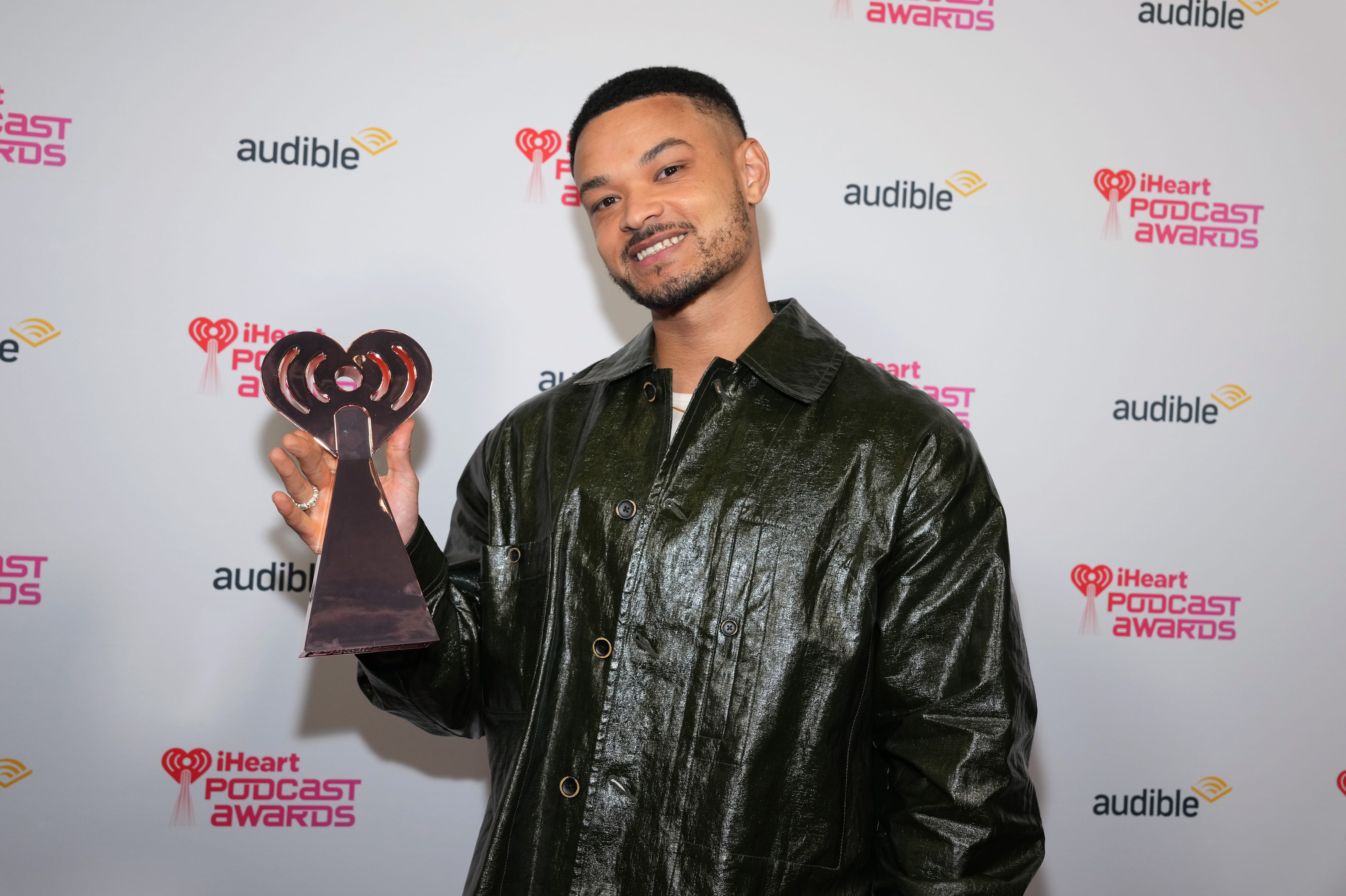 Steven Barlett holding up an award