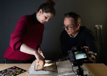 Medieval tale of Merlin and King Arthur found hiding as a book cover