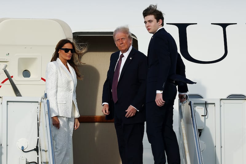 Melania, Donald, and Barron Trump.