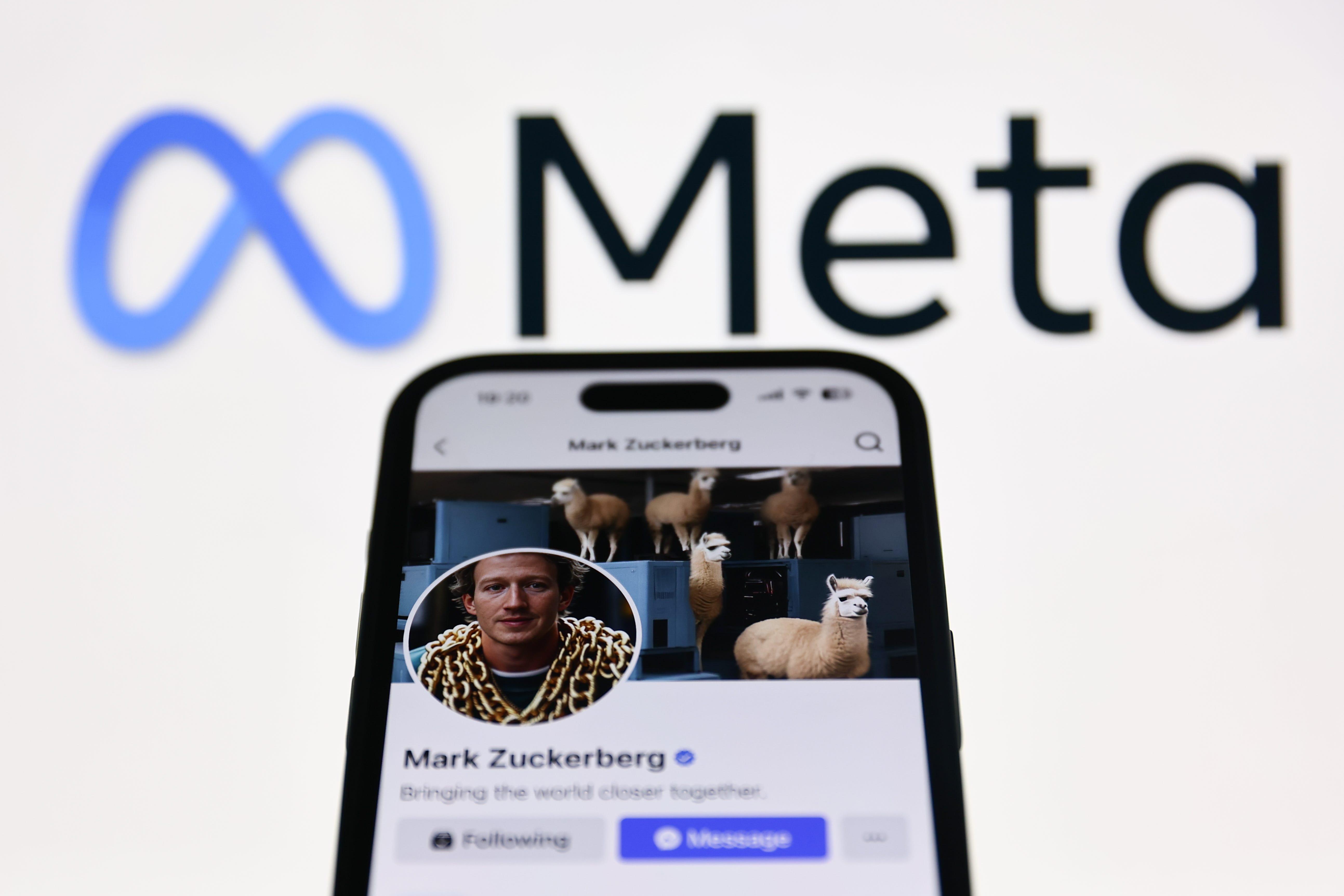 meta logo zuckerberg phone