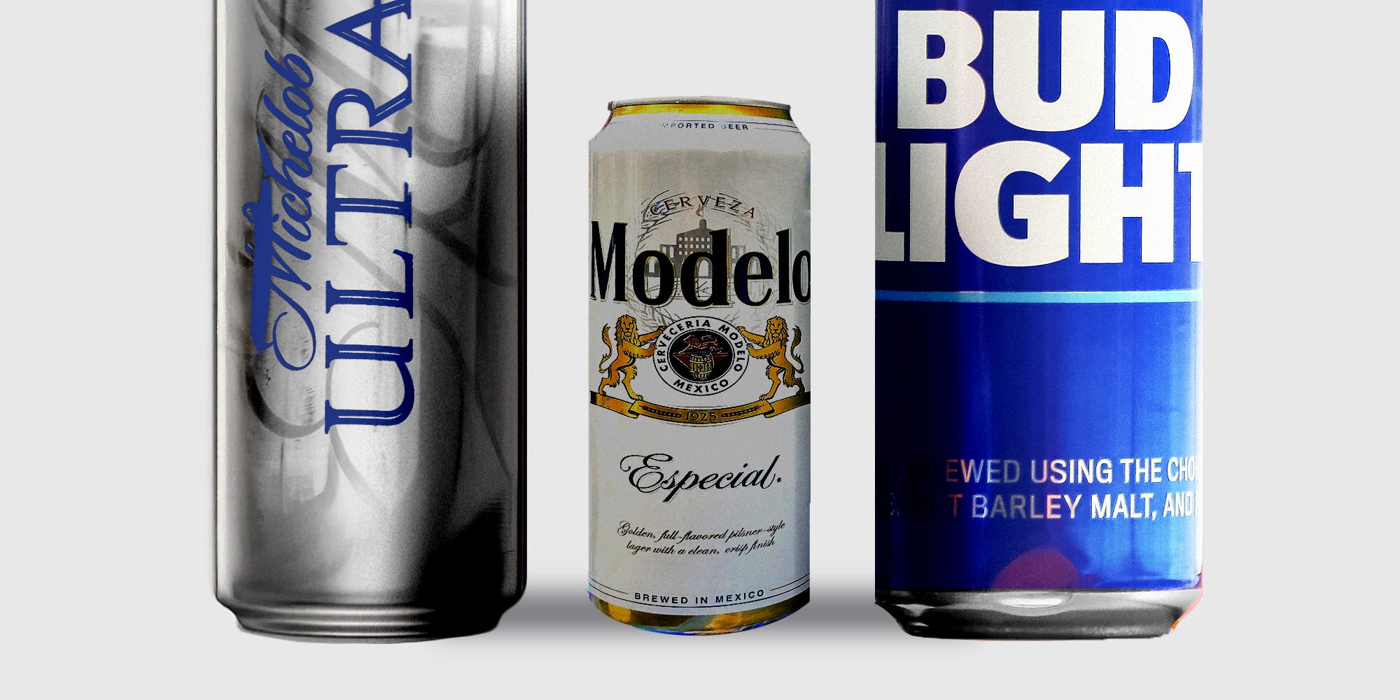 Small Modelo in between giant Michelob and Bud Light cans.