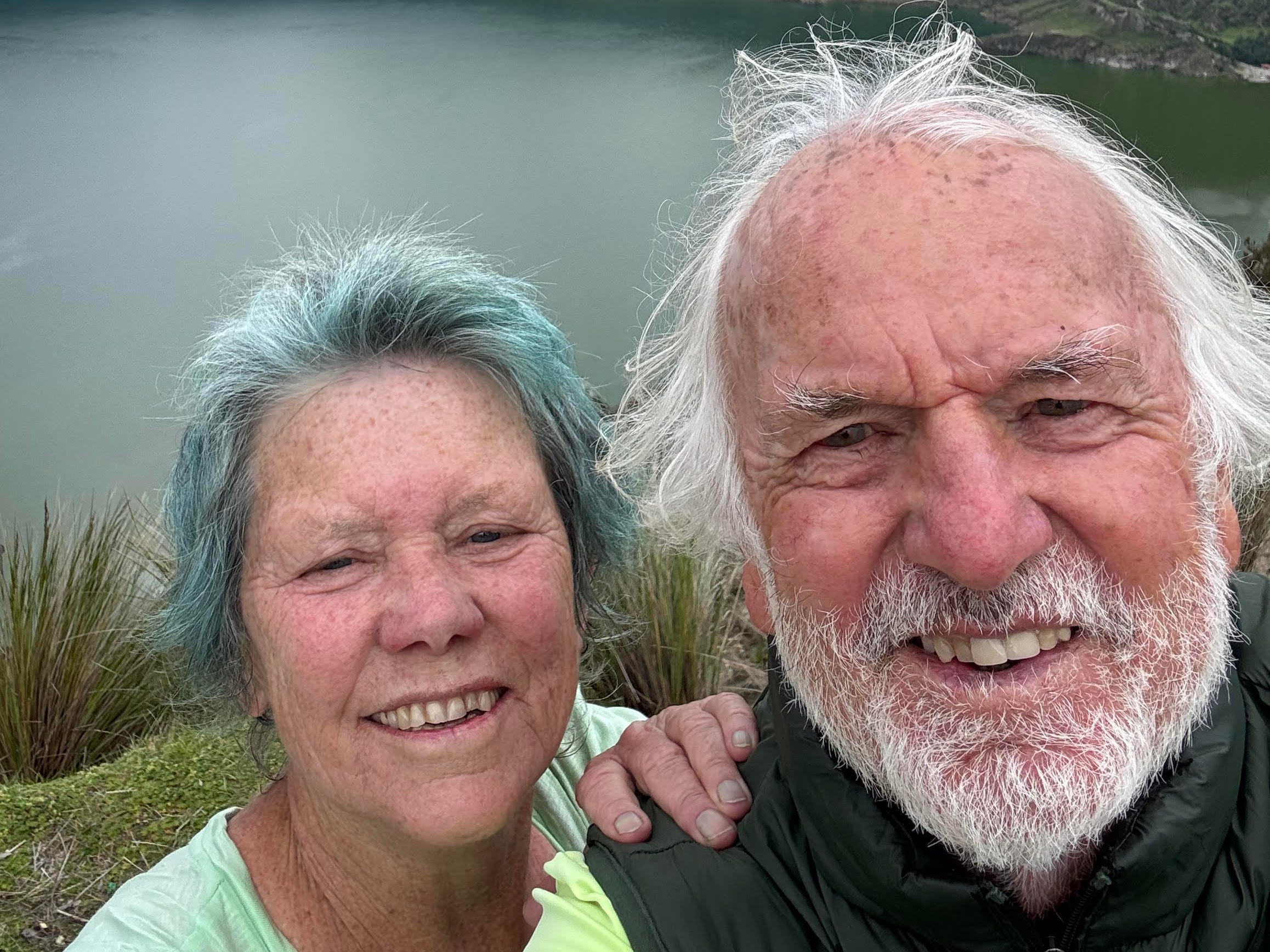 The author and her husband Barry standing in front of Quilotoa Lake