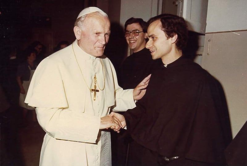 Robert F. Prevost, now Pope Leo XIV, with Pope John Paul II.