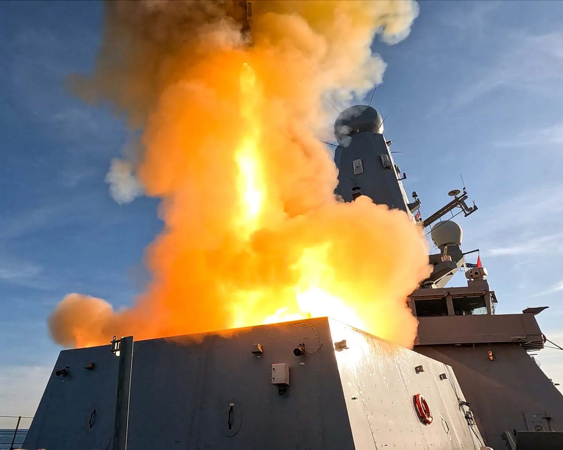 HMS Dragon firing.