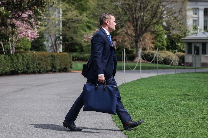 U.S. National Security Advisor Mike Waltz walks to board Marine One, in Washington, D.C., U.S., April 3, 2025. REUTERS/Carlos Barria