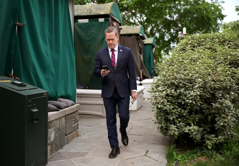 WASHINGTON, DC - MAY 01: National Security Advisor Michael Waltz looks at his phone as he prepares for a TV interview at the White House on May 01, 2025 in Washington, DC. This week marks the first 100 days of U.S. President Donald Trump's second term. (Photo by Andrew Harnik/Getty Images)